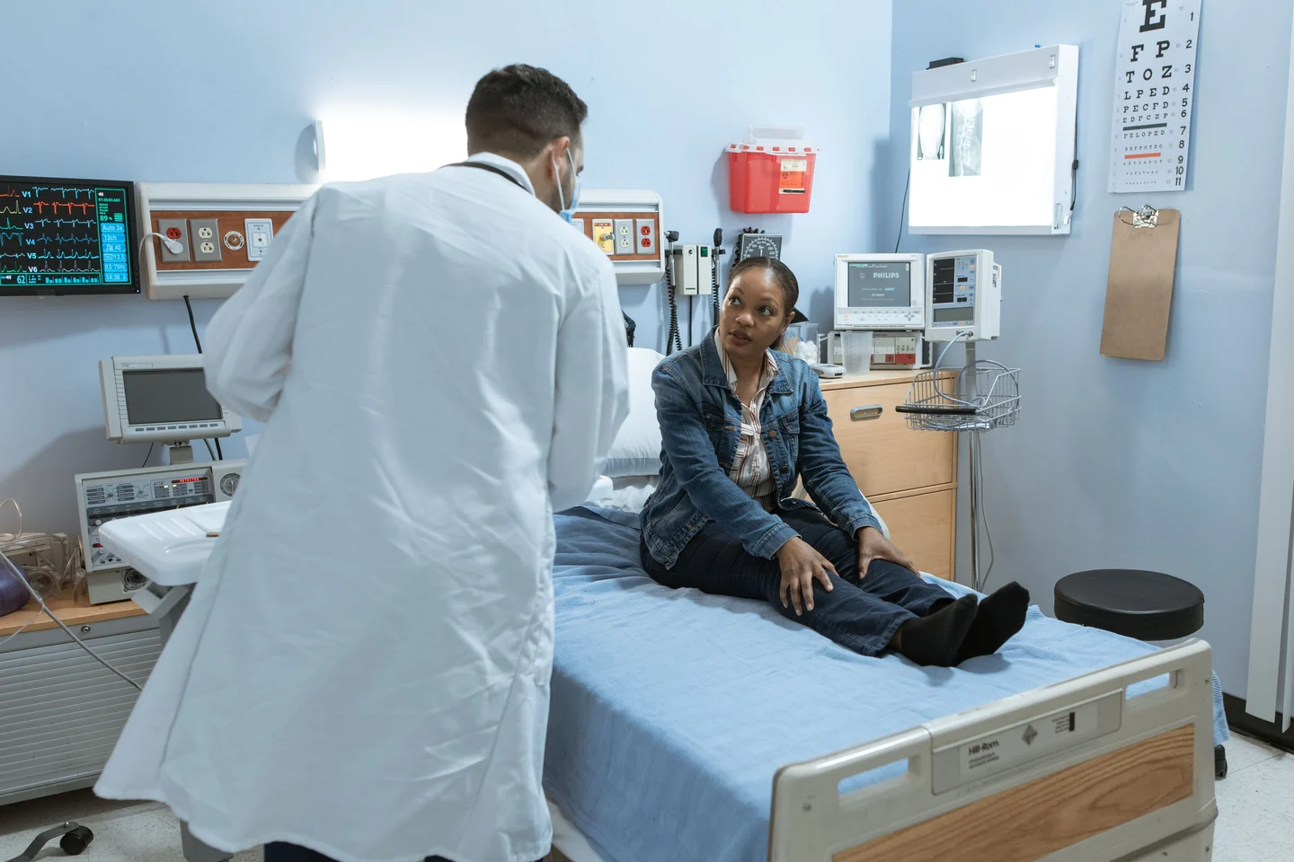 Emergency Medicine placement still serving at VCU Community Memorial Hospital — ER physician stepping into an exam bay
